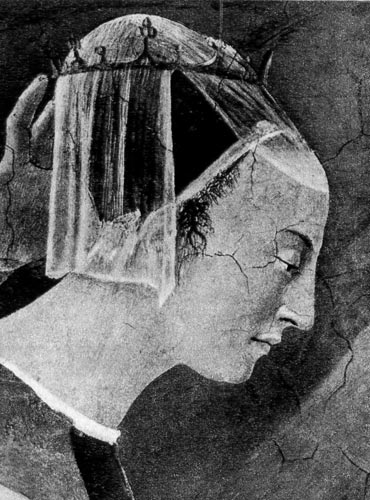 Ренессансная прическа, называемая селла, на голове тонкая короткая накидка и корона